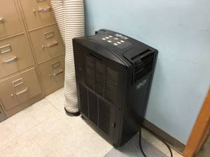 lot 27 image: Tripp-Lite Portable Air Conditioner