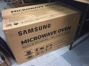 lot 107 image: Samsung Over-The-Range Microwave