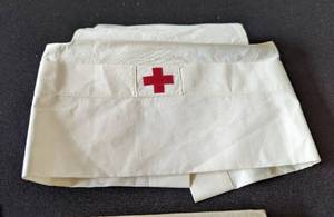 lot 193 image: World War II Pins and Red Cross Nurse Memorabilia