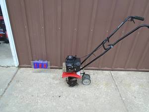 Gas powered mini tiller. Tecumsch motor. Tested & works. As shown.