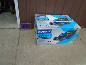Kobalt 40 volt cordless push mower with charger. No battery. Lightly used. As shown.