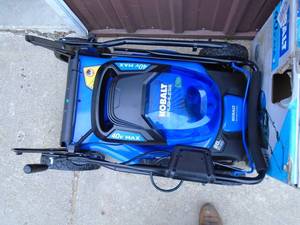 Kobalt 40 volt cordless push mower with bagger. Includes battery & charger. Tested & works. Lightly used. As shown.
