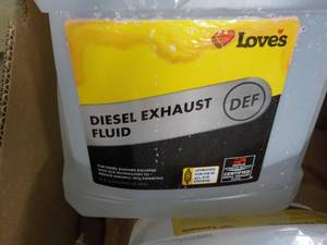 2 - 2 .5 Gallon Jugs Diesel Exhaust...