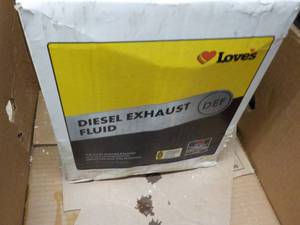 2 - 2 .5 Gallon Jugs Diesel Exhaust...