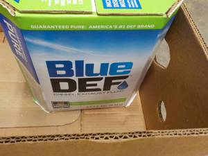 2 - 2 .5 Gallon Jugs Diesel Exhaust...