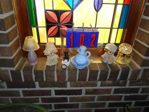 Assortment of figurines. Stained glass not included. As shown.