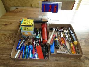 Qty of 2 flats of toolsflashlightspens etc. As shown.
