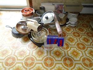 Assortment of kitchen items including mixerantique waffle iron & etc. As shown.