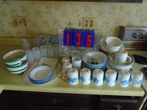Kitchen cupboard contents including corning ware. As shown.