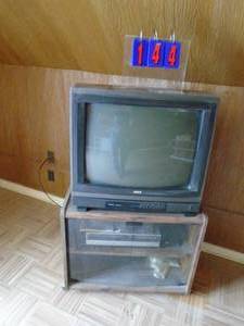26 RCA tv & vhs player with stand. As shown.