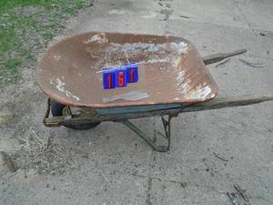 Well used wheel barrow. As shown.