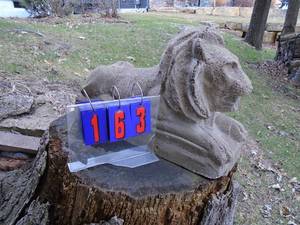 Cement lion yard art. As shown.