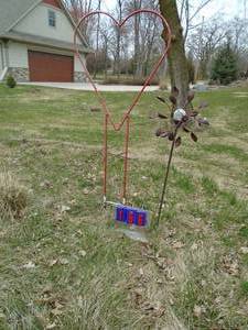 Heart & wind yard art. As shown.