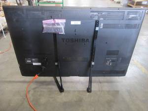 lot 399 image: Toshiba 55SL412U 55 Class - Older TV, Includes Remote - Cat Scratches Just above TV Center (Does not go through film).