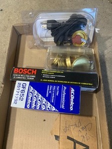 Box of parts for 88 chevy pickup