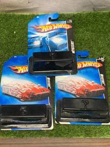 lot 66 image: Lot of 3 Hot Wheels Mystery Cars
