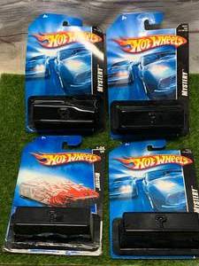 lot 76 image: Lot of 4 Hot Wheels Mystery Cars