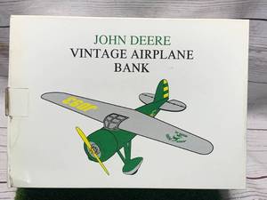 lot 93 image: John Deere Vintage Metal Airplane Bank