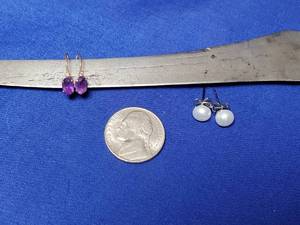 lot 110 image: Purple earrings