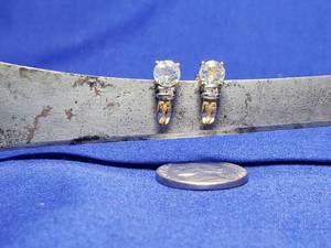 lot 116 image: Gold 10K AC and white saphire earrings