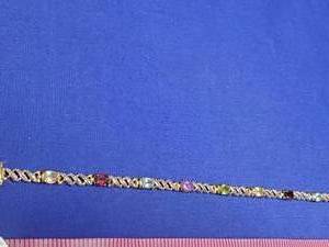 lot 68 image: 925 stamped bracelet with stones