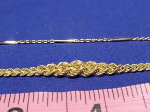 lot 53 image: Gold 14K stamed braclet with diamonds and accents by hallmark bracelet