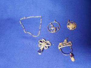 lot 83 image: 14K bracelet and misc pendants
