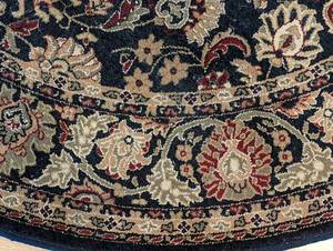 lot 4 image: Round Area Rug