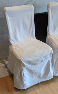 lot 12 image: Pair of Slipcover Accent Chairs