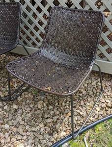 lot 84 image: Pair of Brown Woven Outdoor Chairs