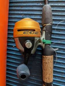 lot 100 image: Zebco Fishing Pole and Carrier