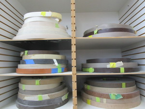 lot 26 image: Edge banding product, assorted tans...