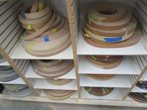 lot 28 image: Edge banding product, eight cubbies...