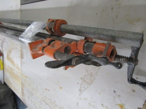 lot 69 image: Pony pipe clamps 1, pipes are 48,...