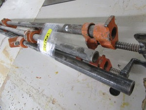 lot 70 image: Pony pipe clamps 1, pipes are 45-5...