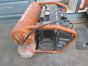 lot 102 image: Ridgid portable air compressor...