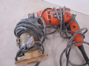 lot 123 image: Ridgid 38 electric drill, Ryobi TR...