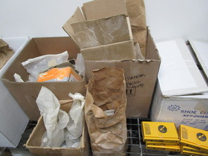 lot 238 image: Grommets, shoe covers, plastic...