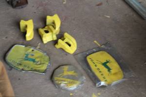 lot 645 image: Vintage John Deere Tractor Weights, Tractor Signage