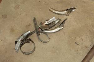 lot 666 image: Lot of (7) Oil Tools - Oil Can Pour Spouts (x5), Oil Filter Wrenches (x2)