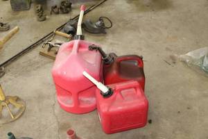 lot 670 image: Lot of (3) Plastic Gas Cans