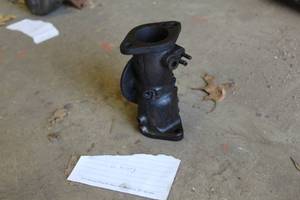 lot 730 image: Schebler John Deere Model G Housing