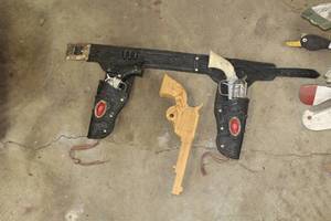 lot 746 image: Vintage Toy Gun Set and Holster, Wood Carving