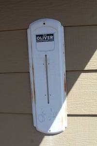 lot 850 image: Vintage Oliver Outdoor Wall Thermometer
