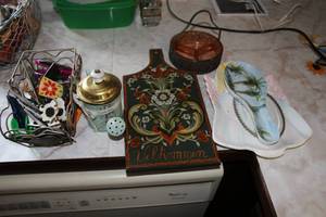 lot 163 image: Basket, Magnets, Candle, Candy Jar, Cutting Board 14x7, Spoon Tray, Angel Tray