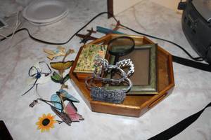 lot 164 image: Floating Wood Table Tray, Note Box, (2) Airplane Dcor, Magnifying Glass, Napkin Holder, Wind Chime