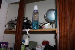 lot 187 image: Misc. Household Items - Tums, Vaseline, Windex, Small Mirror, Towels, Misc. Household Items