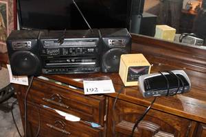 lot 192 image: Lot of (3) Electronics - (2) Clock Radios, Panasonic Boom Box