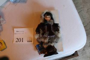 lot 201 image: Alaska Friends 11 Alaskan Eskimo Native Theme Genuine Porcelain Doll