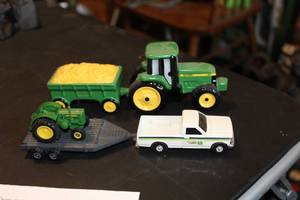 lot 264 image: Lot of (2) John Deere Collectible Car Sets - TractorWagon, TruckTrailerTractor